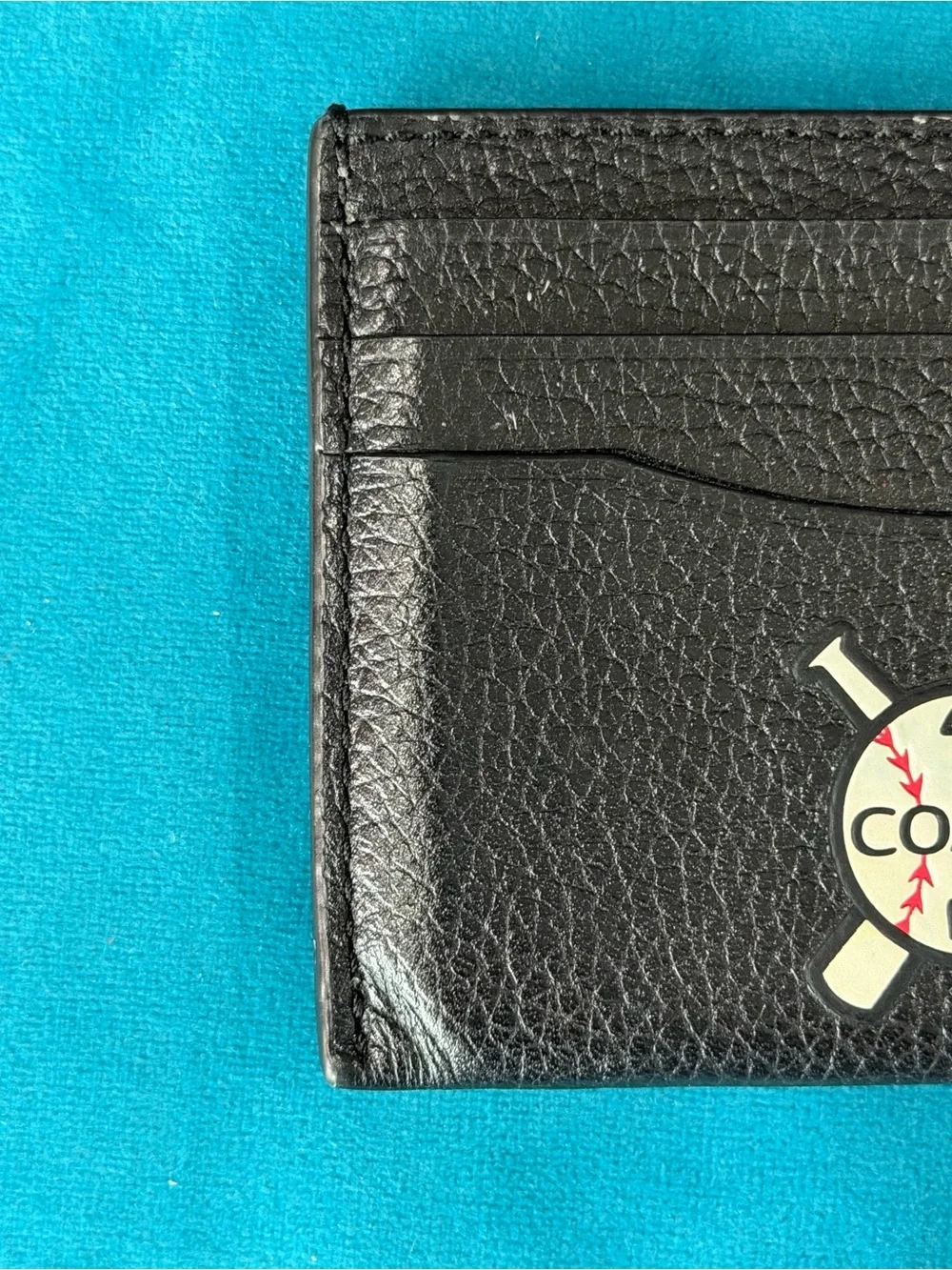 Coach sleek black